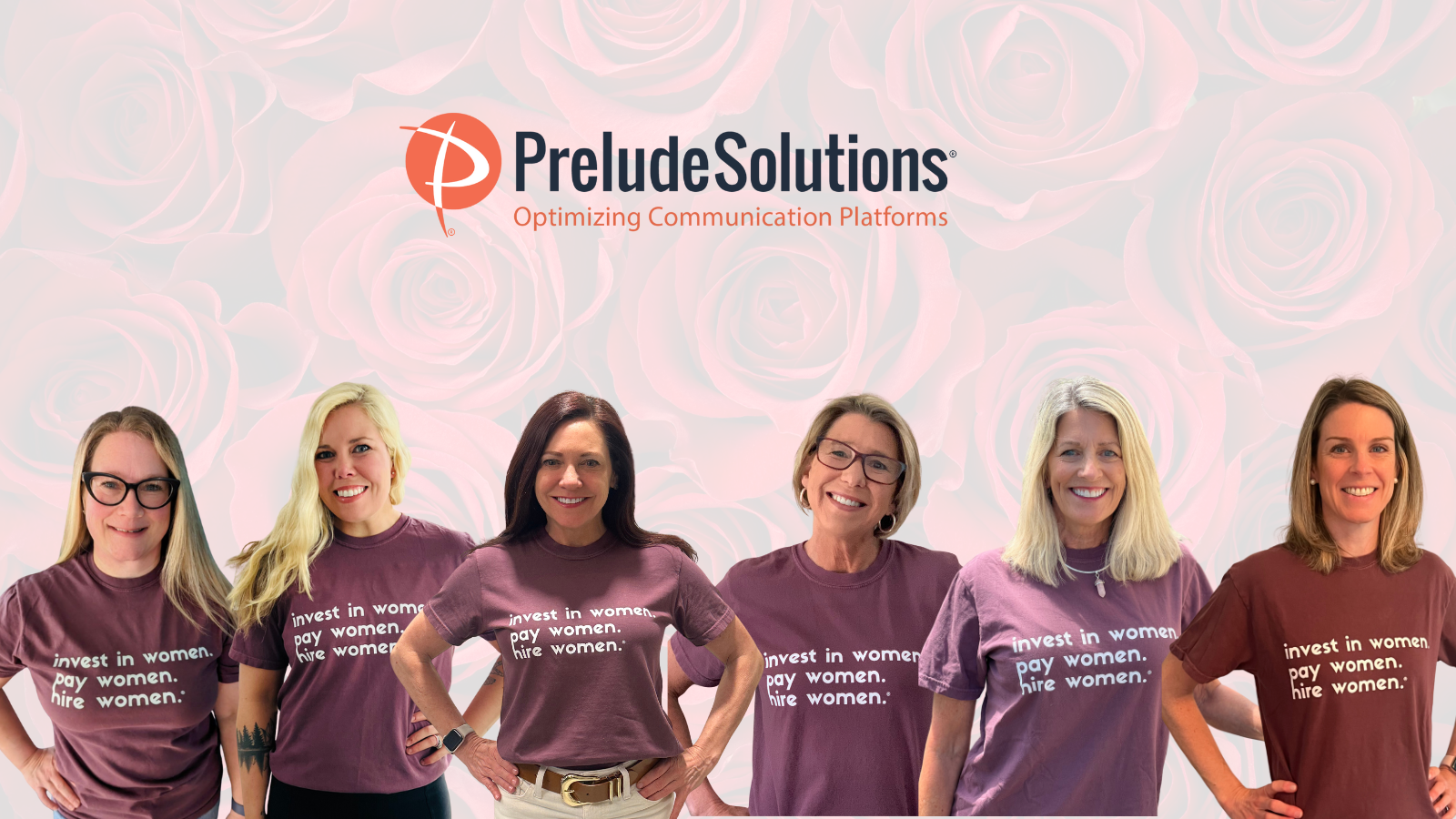 Six women employees from Prelude Solutions wearing pink shirts that say Invest in women. Pay Women. Hire Women.